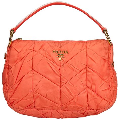 prada clutch padded nylon medium orange|prada purses.